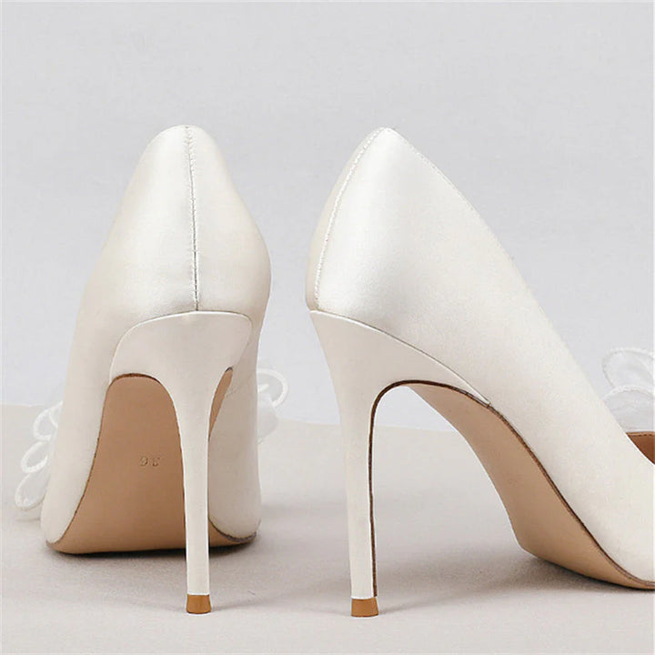 Size 12 white satin bridal stiletto pumps with bow